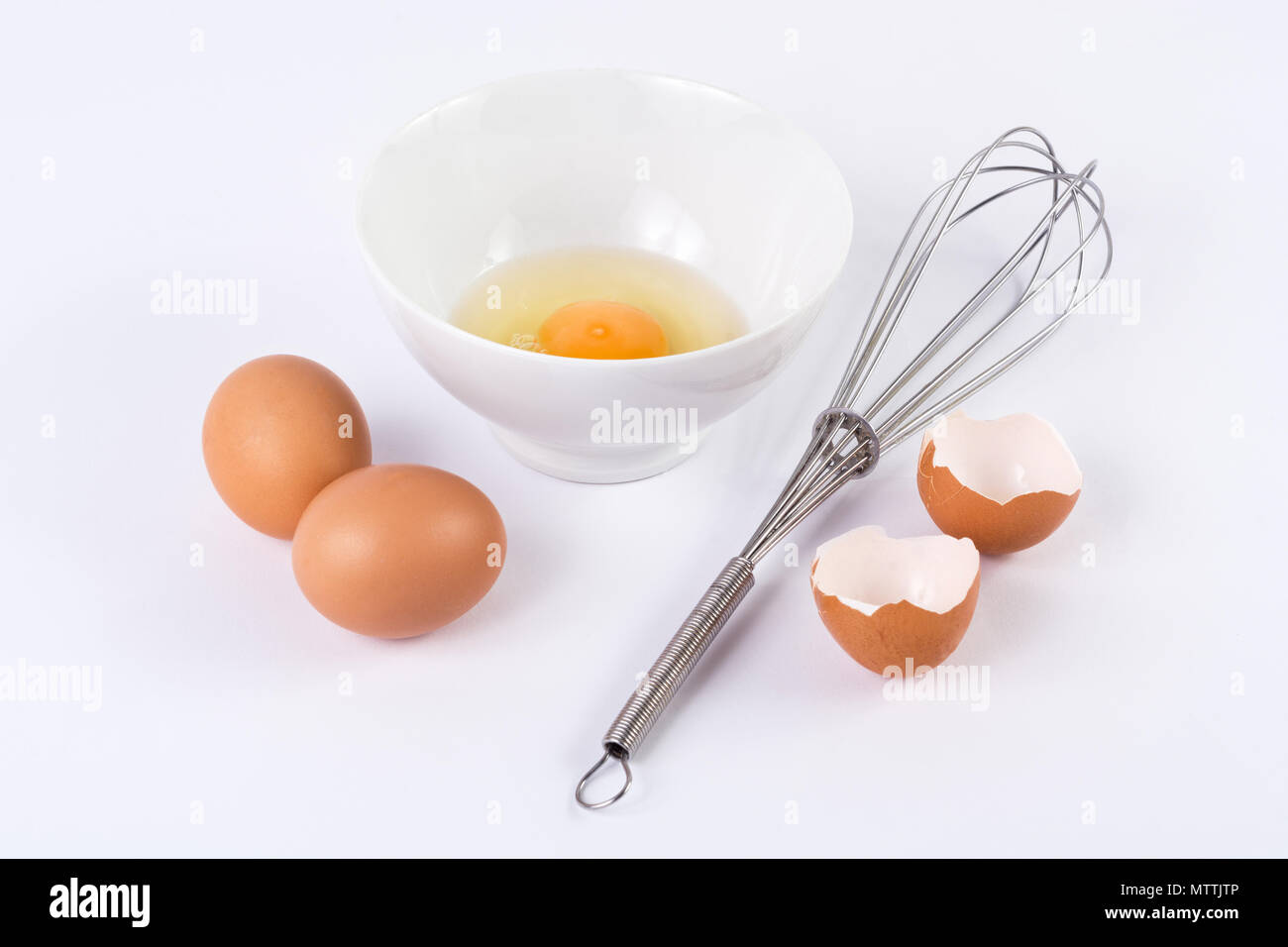 Whisking eggs in bowl hires stock photography and images Alamy