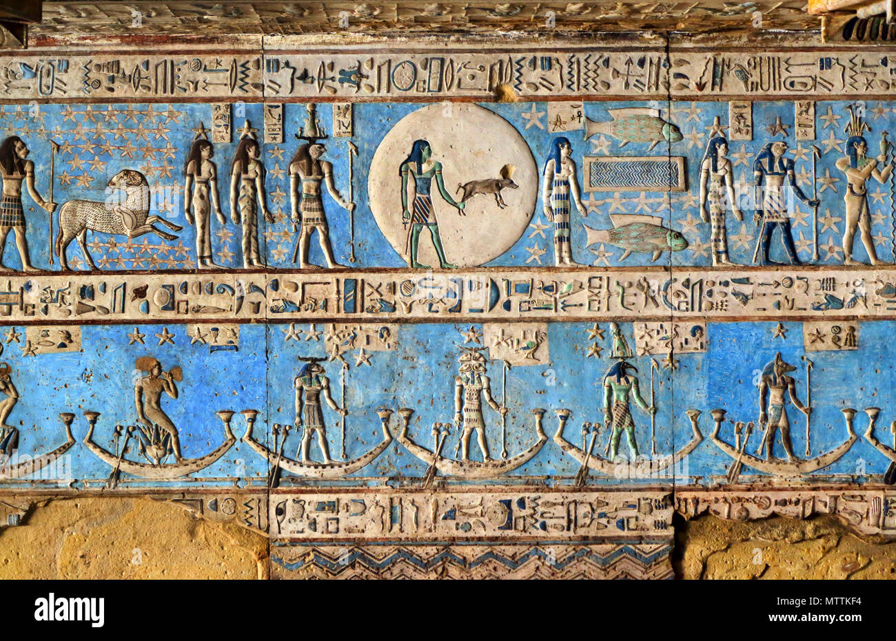 Hieroglyphic carvings and paintings on the interior walls of an ancient