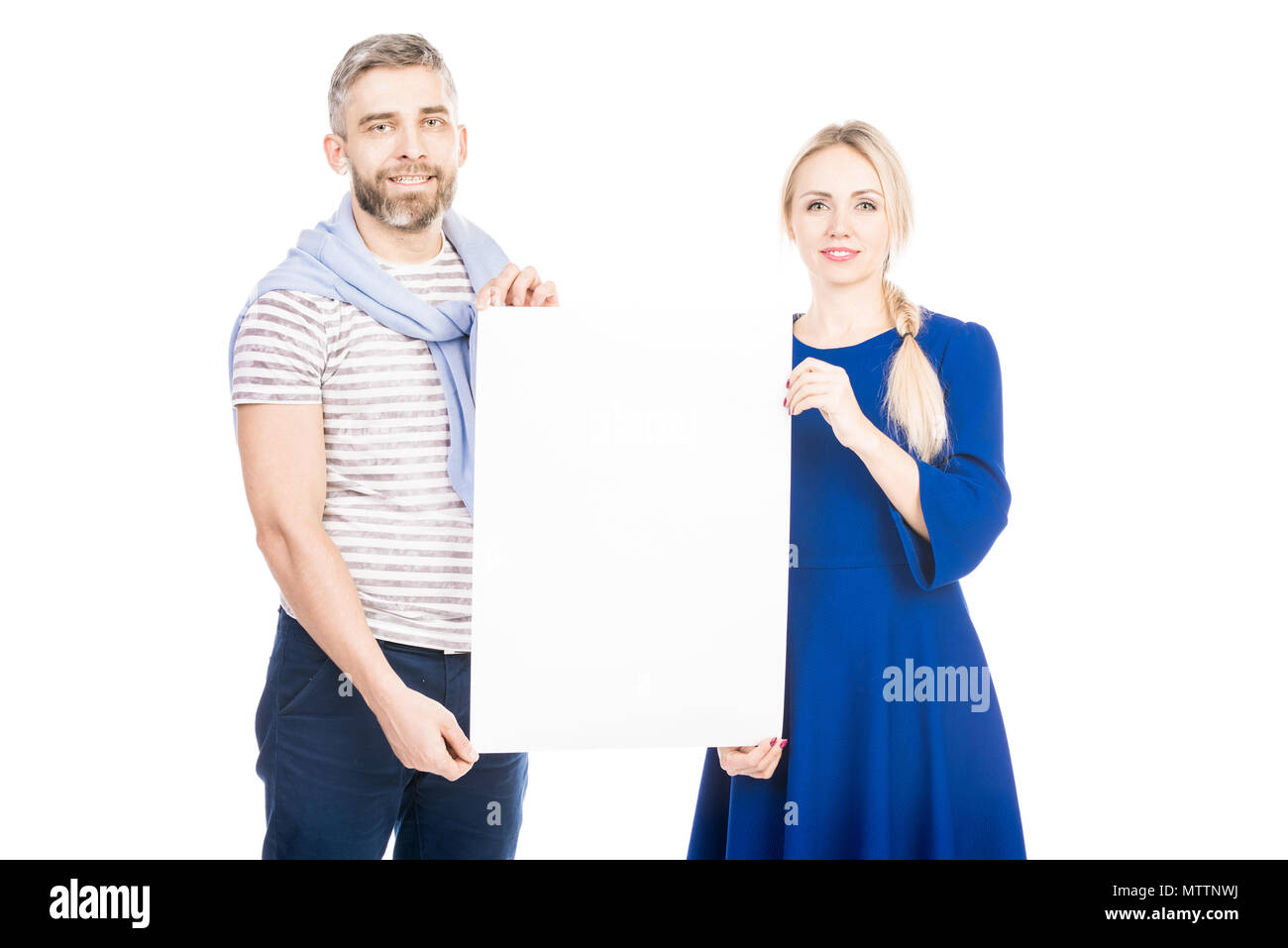 Couple with poster Stock Photo