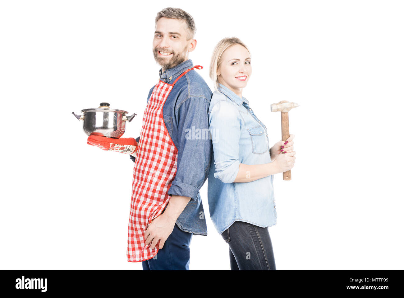 Cheerful Couple With Household Stuff Stock Photo