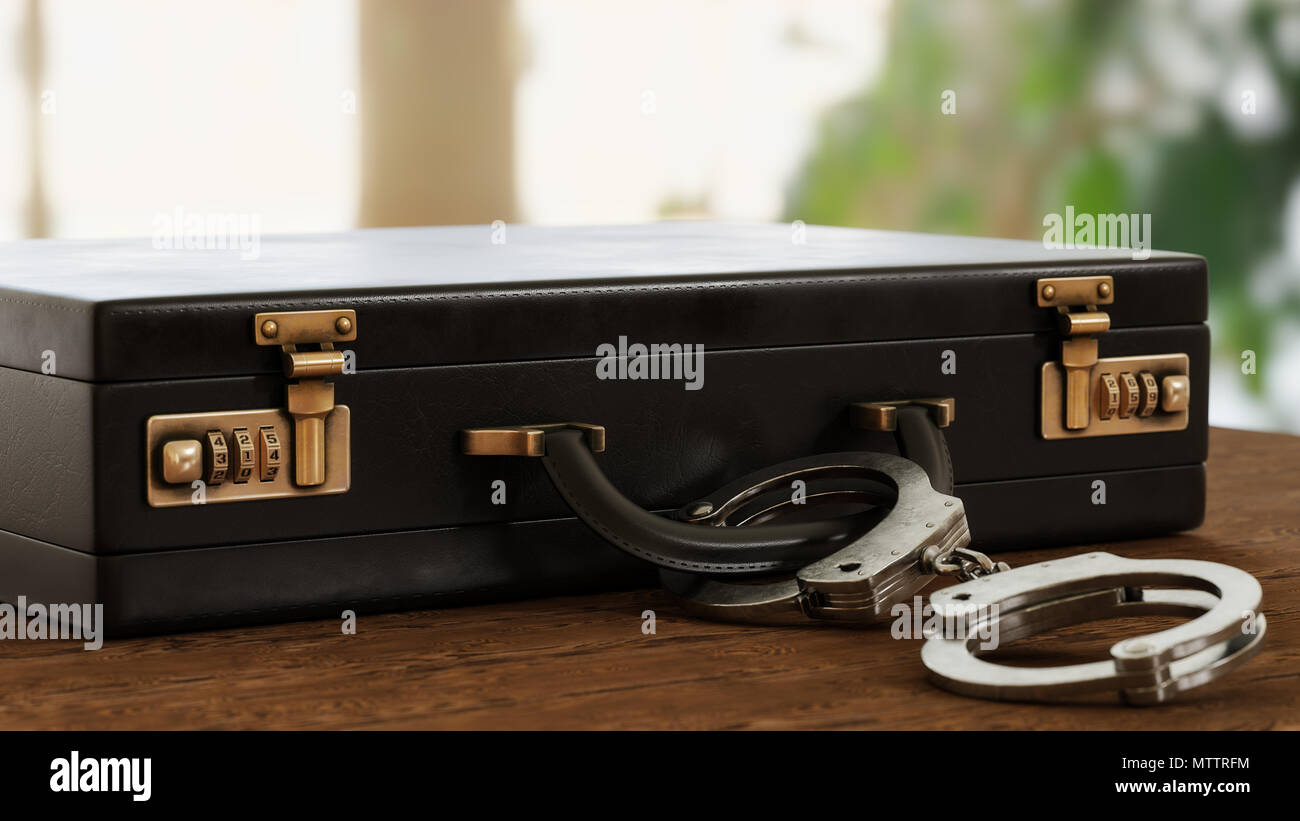 Handcuffs Attached To Briefcase High Resolution Stock Photography and