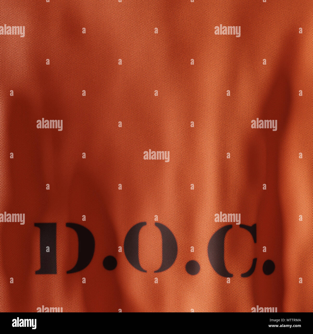 Back of a prisoners apperal with the abbreviation D.O.C. stamped onto the fabric. Stock Photo