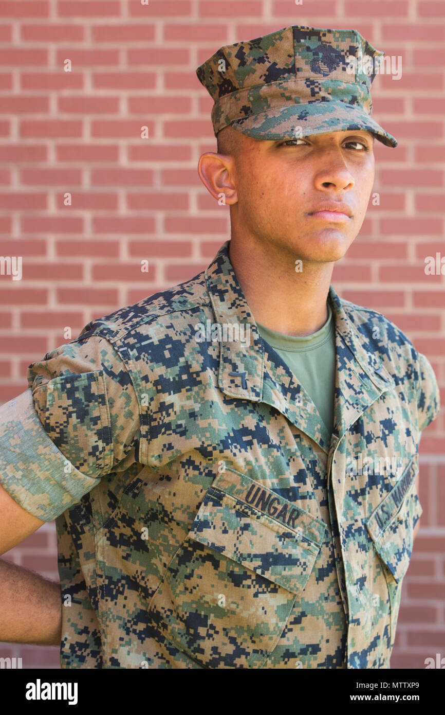 Pfc. Malik A. Ungar, Platoon 1025, Bravo Company, 1st Recruit Training Battalion, earned U.S. citizenship April 27, 2017, on Parris Island, S.C. Before earning citizenship, applicants must demonstrate knowledge of the English language and American government, show good moral character and take the Oath of Allegiance to the U.S. Constitution. Ungar, from Augusta, Ga., originally from Canada, is scheduled to graduate April 28, 2017. Stock Photo
