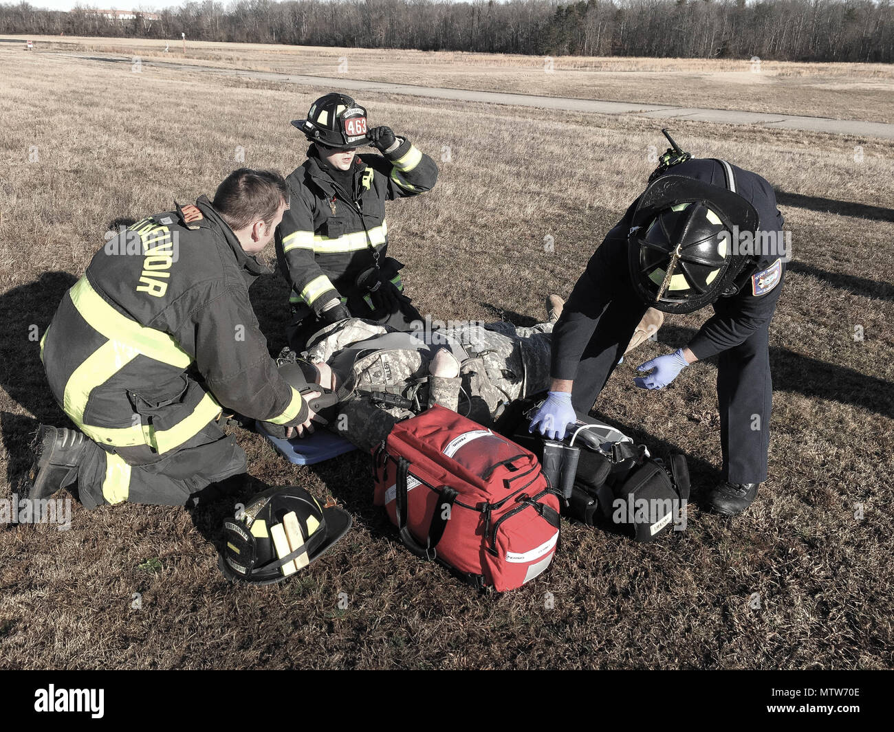 Fort Belvoir Fire and Emergency Medical Services personnel treat an ...