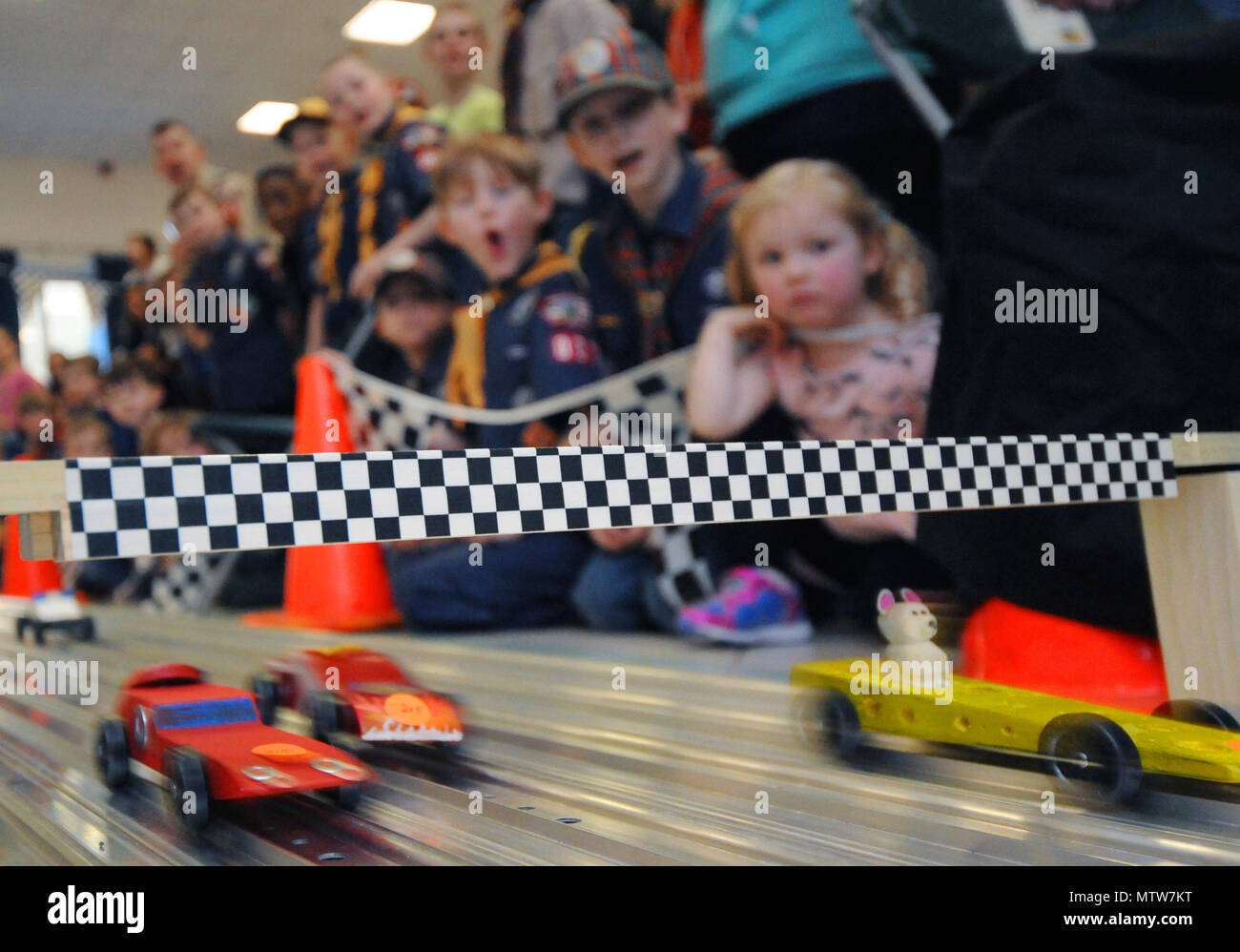 170121-N-GS507-094 Approximately 35 Cub Scouts from Pack 007, along with their families and friends participate in the annual Pinewood Derby, which was held at the Naples Elementary School at Naval Support Activity Naples, Italy, on January 21, 2017. The Pinewood Derby is one of the most popular events in Scouting, and is enjoyed by Cub Scouts around the world. The purpose of the Pinewood Derby is to help the Cub Scout build a team relationship with their parent or helper, experience the sense of accomplishment and the excitement of competition, learn good sportsmanship, and to have fun. U.S.  Stock Photo