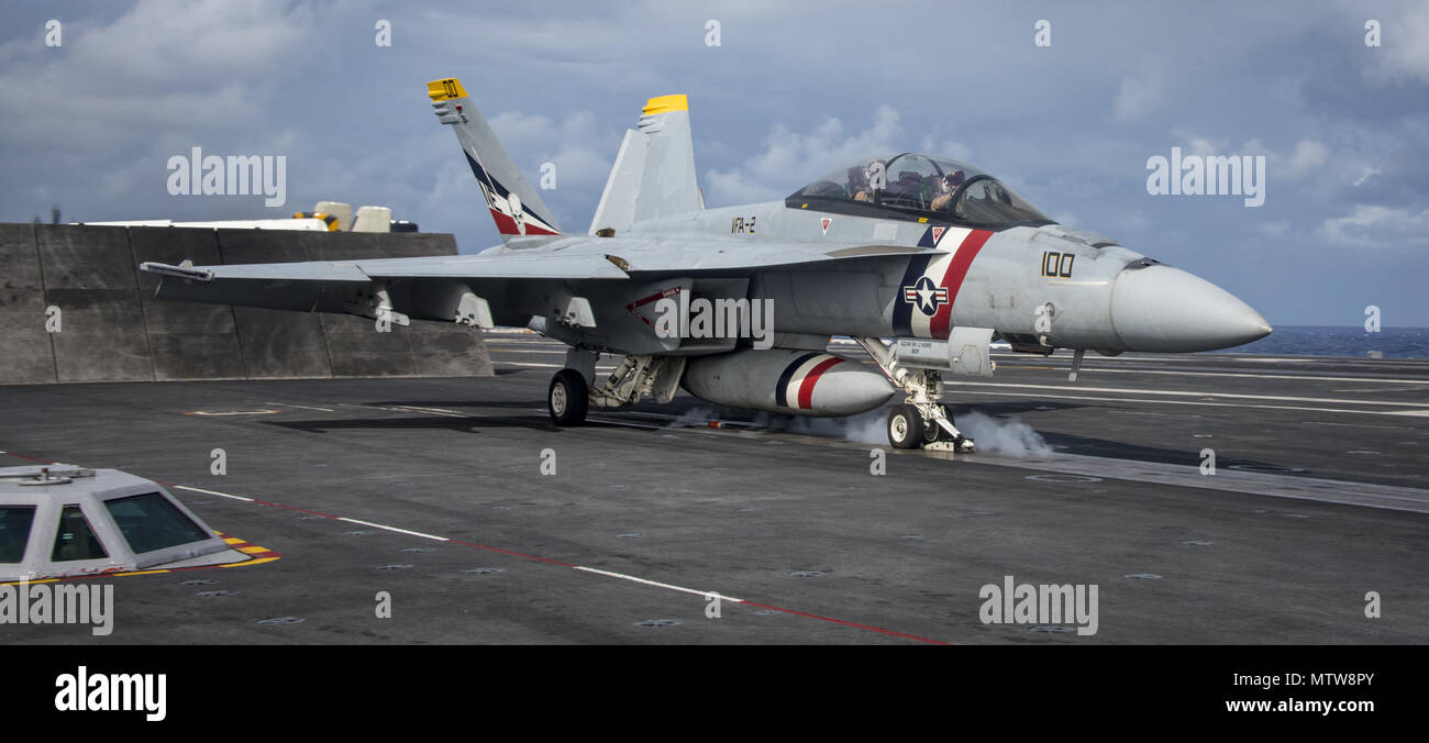 170125-N-BL637-231 PACIFIC OCEAN (Jan. 25, 2017) An F/A-18F Super Hornet from the “Bounty Hunters” of Strike Fighter Squadron (VFA) 2 takes off from the aircraft carrier USS Carl Vinson (CVN 70) flight deck. The Carl Vinson Carrier Strike Group is on a regularly scheduled Western Pacific deployment as part of the U.S. Pacific Fleet-led initiative to extend the command and control functions of U.S. 3rd fleet. U.S Navy aircraft carrier strike groups have patrolled the Indo-Asia-Pacific regularly and routinely for more than 70 years.  (U.S. Navy photo by Mass Communication Specialist 2nd Class Se Stock Photo
