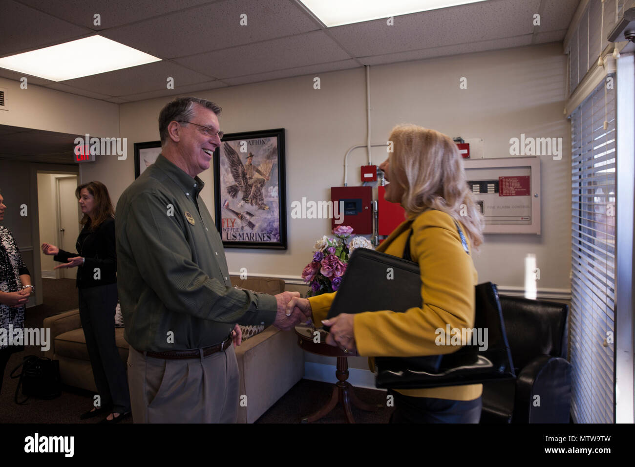 Mrs Gail Walters The Wife Of The Assistant Commandant Of The Marine Corps Gen Glenn M Walters Meets With Michael T Largent The Director Of Marine Corps Community Services At Marine Corps