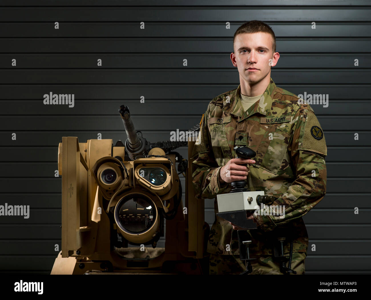 A U.S. Army Reserve Soldier poses with a Common Remotely Operated ...