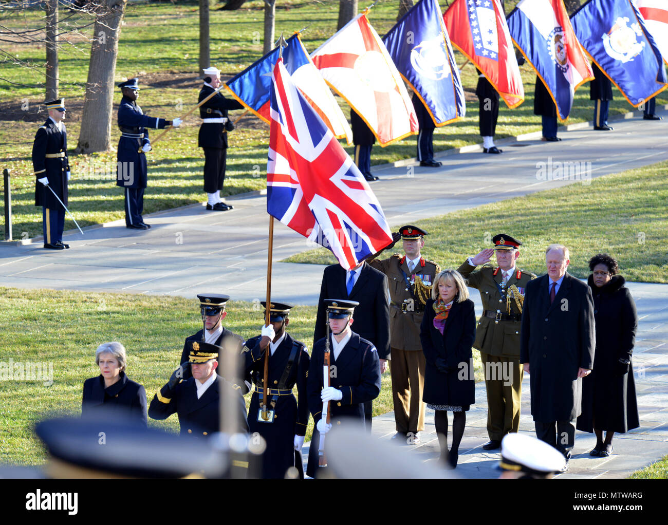 The Right Honorable Theresa May, Prime Minister of the United Kingdom, participated in an Armed Forces Full Honor wreath laying ceremony hosted by Maj. Gen. Bradley A. Becker, commanding general, Joint Force Headquarters-National Capital Region and The U.S. Army Military District of Washington, Jan. 27, 2017, at the Tomb of the Unknown Soldier, Arlington National Cemetery. The wreath laying is a part of the Prime Minister’s official visit to the United States. (U.S. Army photos by: Staff Sgt. Austin L. Thomas) Stock Photo