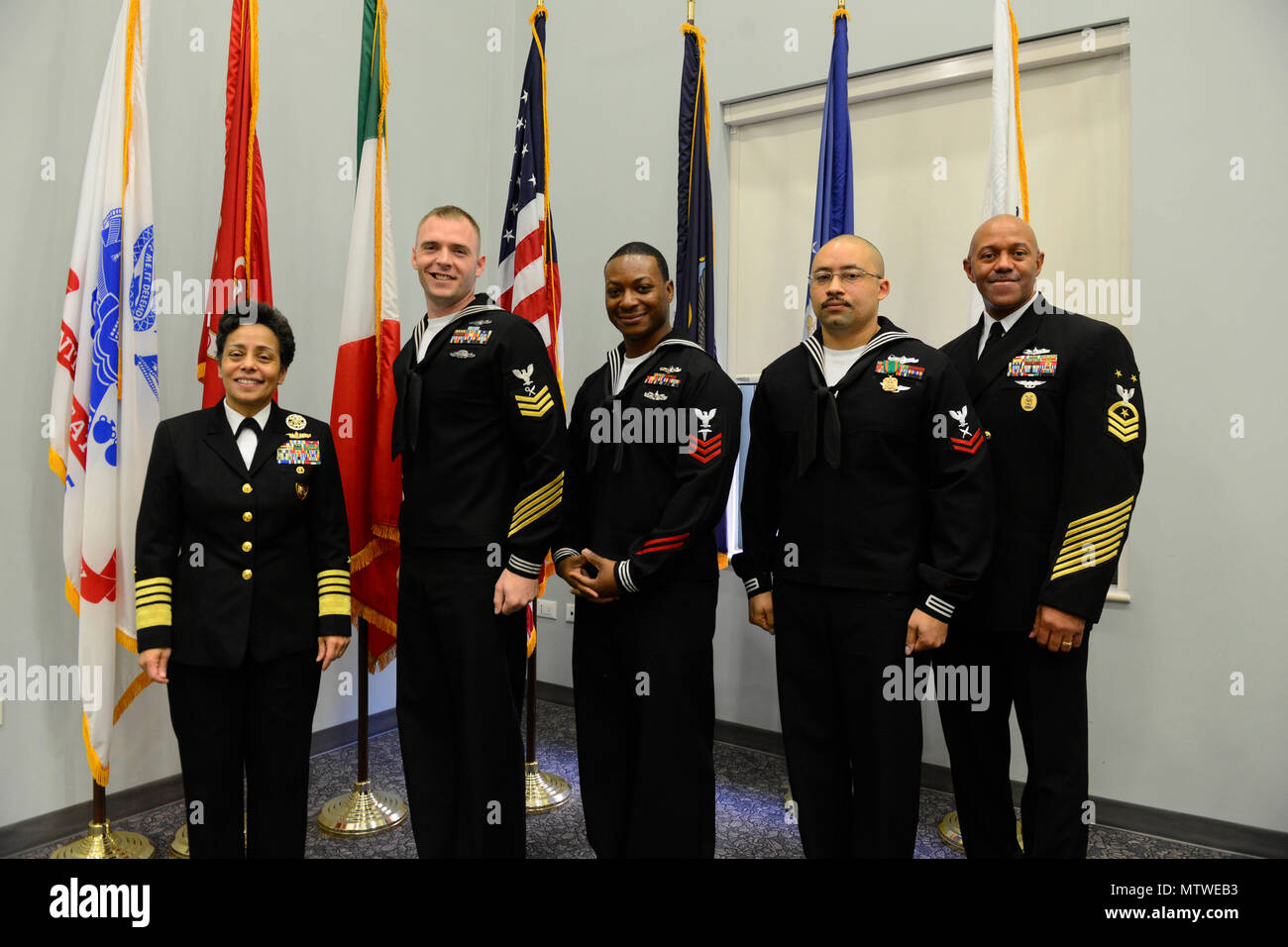 170127-N-SS492-702 NAVAL SUPPORT ACTIVITY NAPLES, Italy (Jan. 27, 2017) From left to right: Commander, U.S. Naval Forces Europe-Africa, Adm. Michelle Howard; U.S. Naval Forces Europe-Africa Sea Sailor of the Year, Intelligence Specialist 1st Class Kevin Pulley; U.S. Naval Forces Europe-Africa Shore Sailor of the Year, Hospital Corpsman 1st Class Kenneth Terrell; U.S. Naval Forces Europe-Africa Junior Sailor of the Year Yeoman 2nd Class Eric Horne and U.S. Naval Forces Europe-Africa Fleet Master Chief Raymond D. Kemp Sr. pose for a photo at the Commander, U.S. Naval Forces Europe-Africa Sailor  Stock Photo