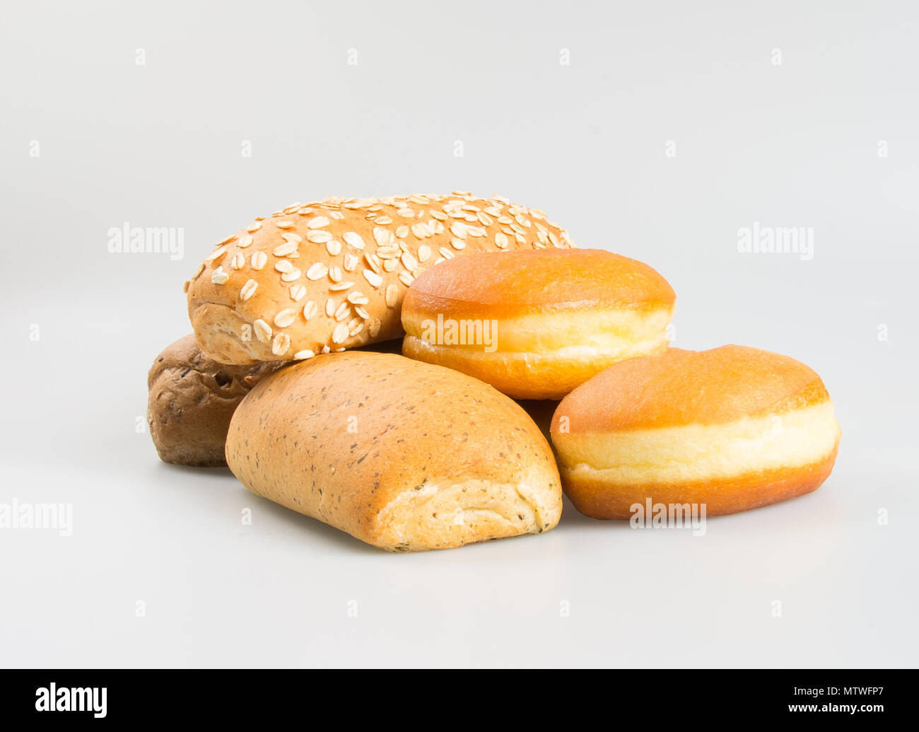 Hot dog bun and donut on a background hi-res stock photography and