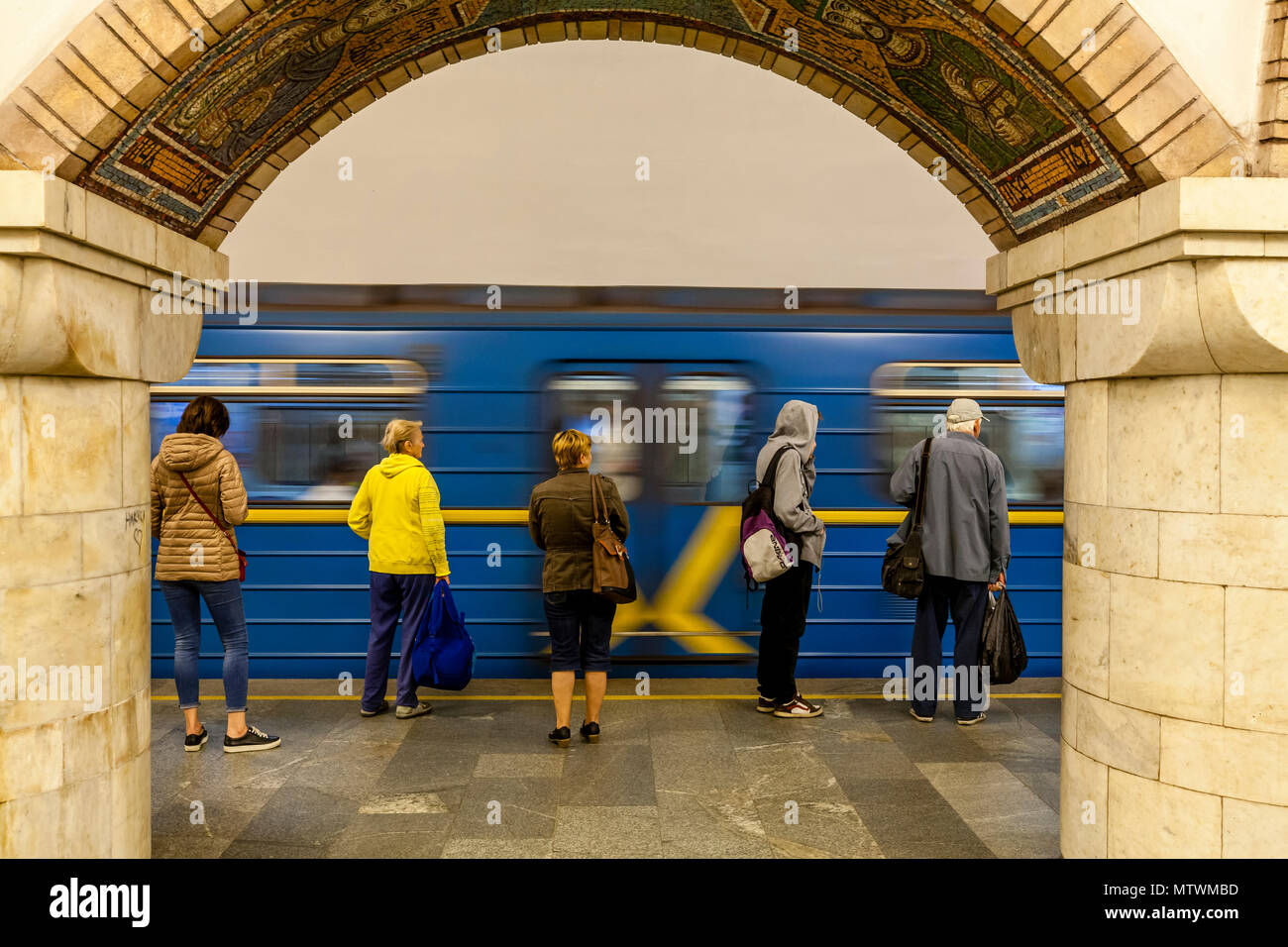 Passengers Travelling Through Zoloti Vorota Metro Station, Kiev, Ukraine Stock Photo