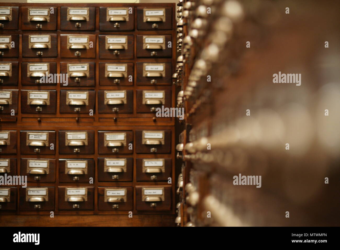 Vintage wooden library card catalog. A public library in Poznan (Poland