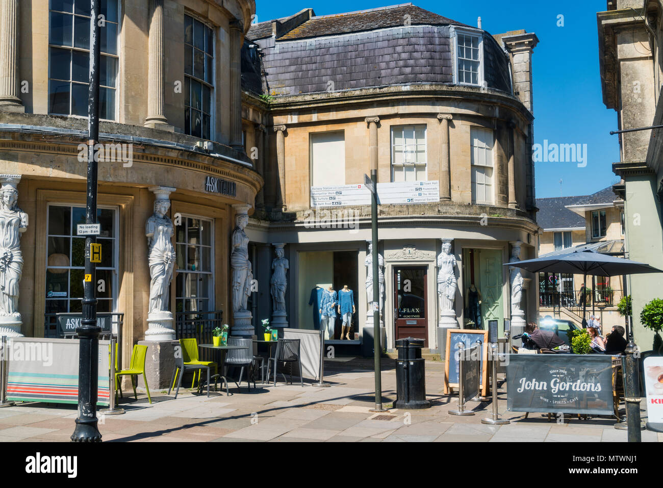 Caryatids statues, architectural features, shops, Cheltenham, Gloucestershire, England UK Stock Photo