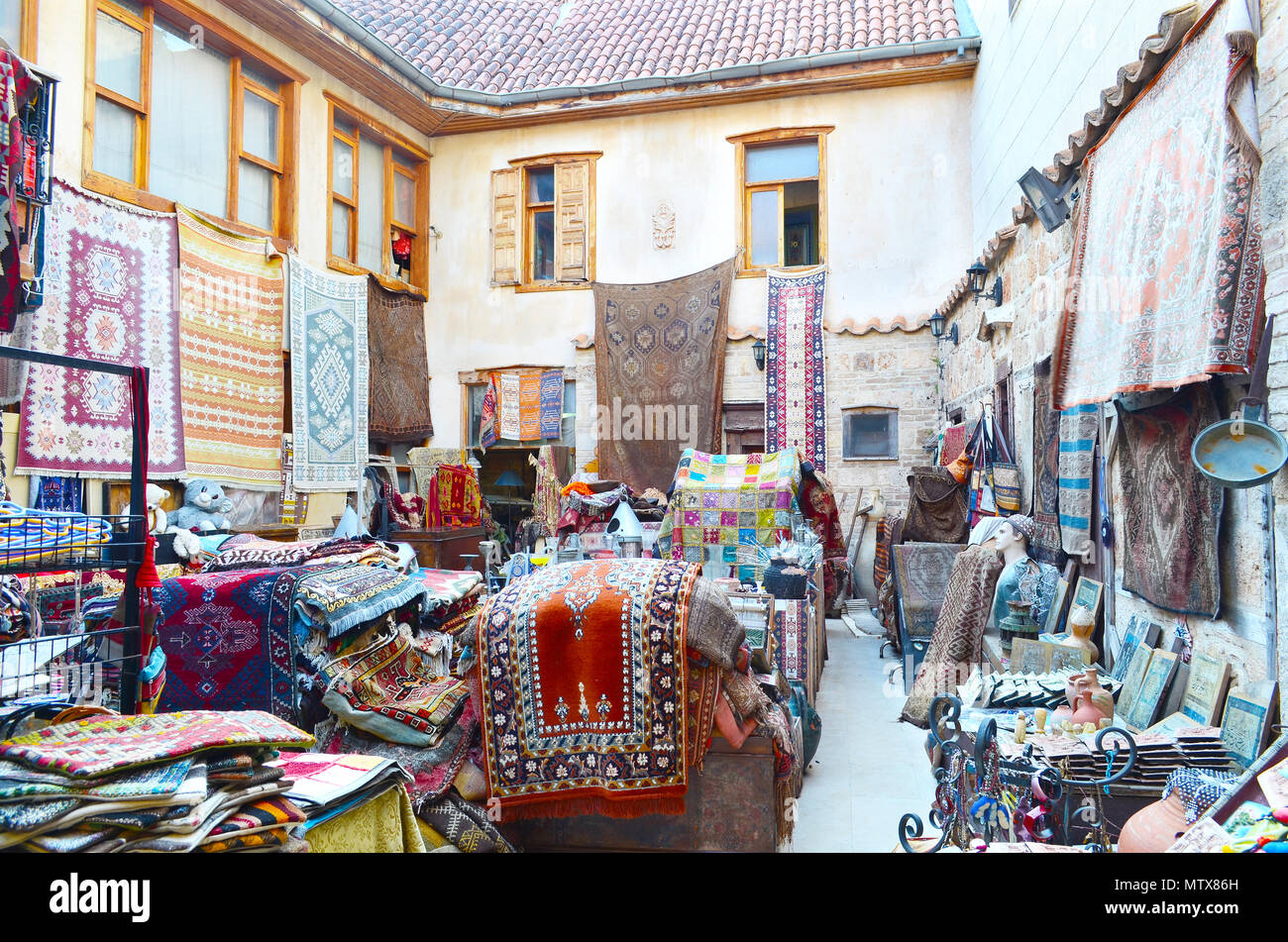 Store carpets and old things in the easten town. Stock Photo