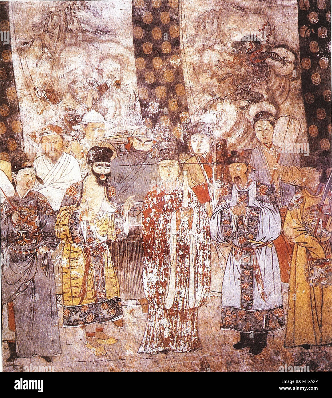 . English: In mid-Imperial China, characters in theatrical performances wore elaborate costumes and stereotyped facial makeup, shown here in a large Yuan Dynasty (1279-1368 CE) mural in a hall (明应王殿) of the Guangsheng Temple (广胜寺) in Hongtong county (洪洞県), Shanxi province. On the top of this mural is a banner that reads Ráodū jiànài Dàxíng sǎnyuè Zhōng Dūxiù zàicǐ zuòchǎng Tàidìng yuánnián sìyuè (堯都見愛/大行散樂忠都秀在此作場/泰定元年四月 'Ráodū liked it. Zhōng Dūxiù, a famous actress of sǎnyuè performed here. The fourth month of year one in era Tàidìng.') 中文: 雜劇壁畫。中國山西省洪洞縣廣勝寺明應王殿壁畫。畫上有一匾額：堯都見愛/大行散樂忠都秀在此作場/泰定元年四 Stock Photo