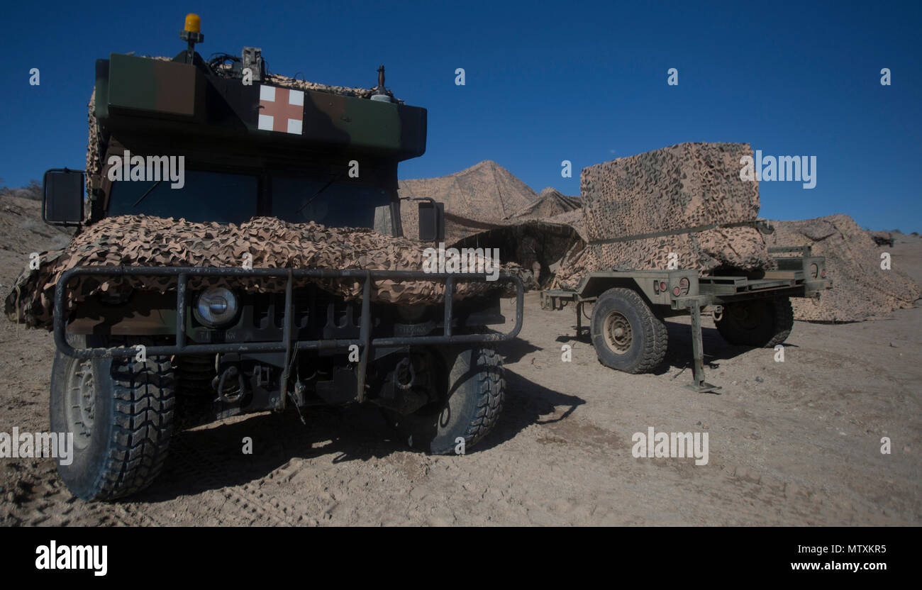 Jury Rigging Humvee A Humvee armored vehicle and accompanying gear are concealed under ...