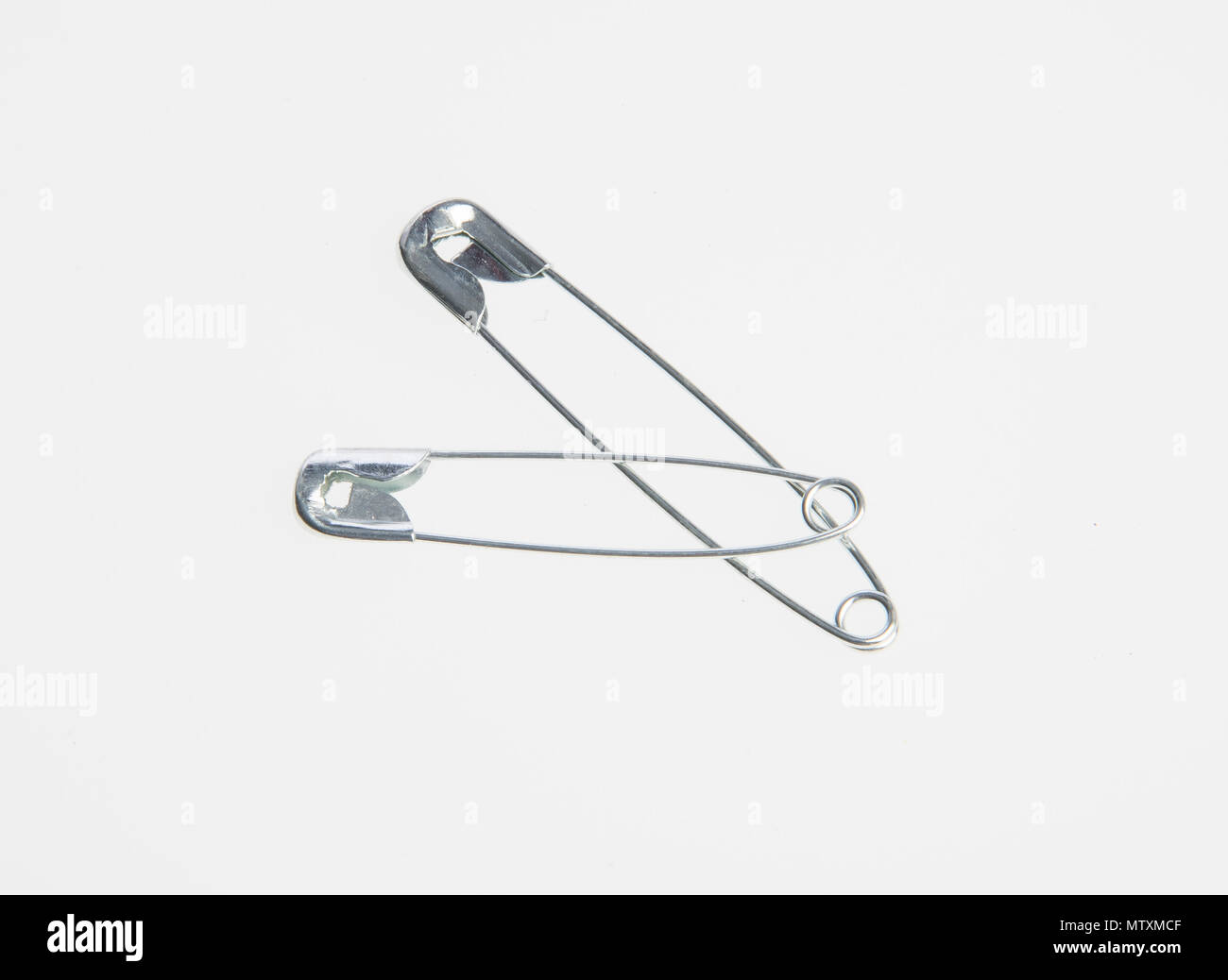 Pin or sewing safety pin on a background Stock Photo Alamy