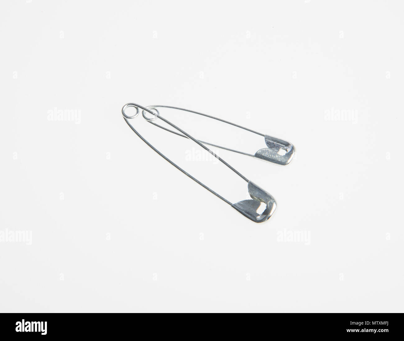 Pin or sewing safety pin on a background Stock Photo Alamy