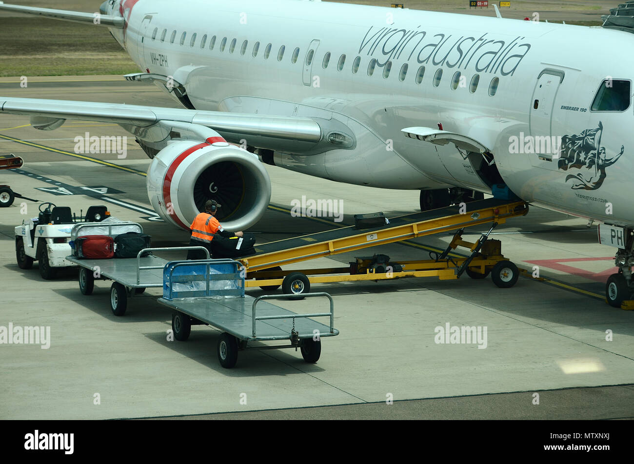passenger jet at airport Stock Photo