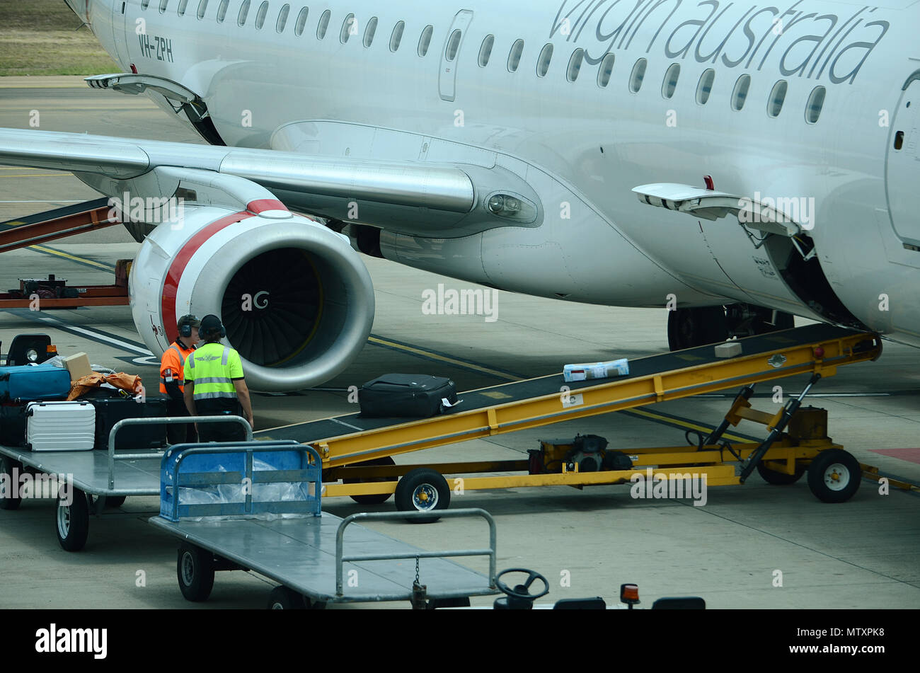 passenger jet at airport Stock Photo