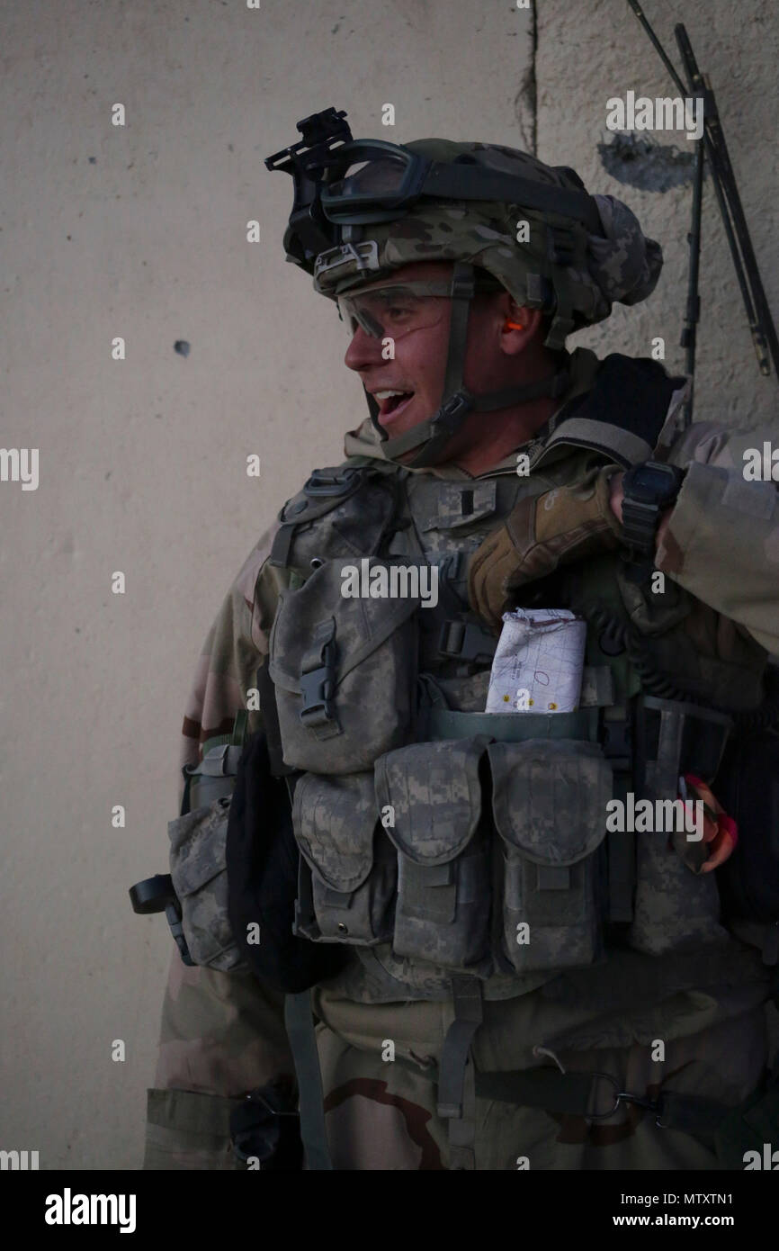 A U.S. Army soldier from an infantry battalion clears an objective ...