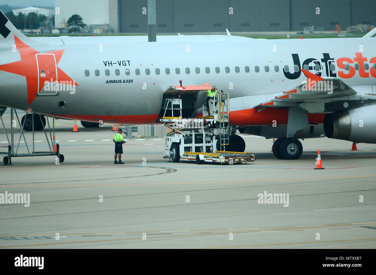 passenger jet at airport Stock Photo