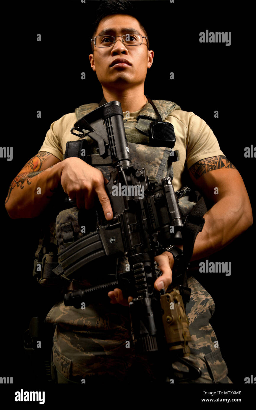 Senior Airman David, 799th Security Forces Squadron alarm monitor, displays his tattoos Jan. 26, 2017, at Creech Air Force Base, Nev. The flowers on his arm represent the five women in his Senior Airman David, 799th Security Forces Squadron alarm monitor, displays his tattoos Jan. 26, 2017, at Creech Air Force Base, Nev. The flowers on his arm represent the five women in his
