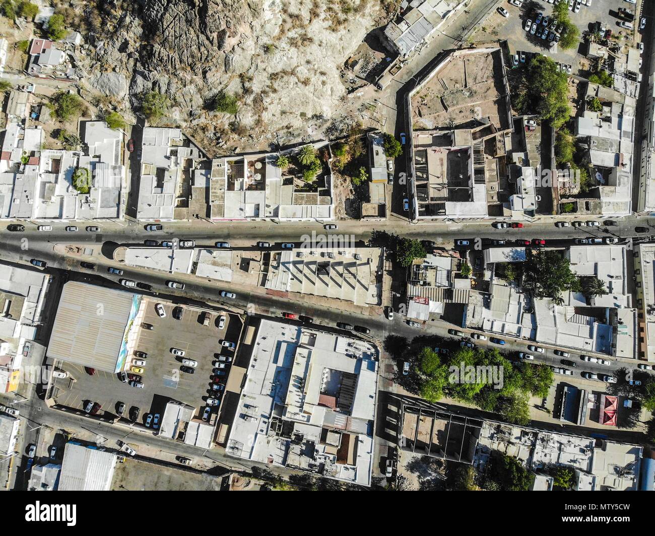 Vista aérea de la colonia Centro o centro histórico de Hermosillo. Barra hidalgo. Calle Hidalgo, cuchilla, calle No Reelección, calle mina. Techo, azotea, azotea verde, estacionamiento, ciudad del sol, dia soleado, luz y sombra, sombra, sin sombra, diseño, diseño arquitectónico , triangulo, cuadro, rectángulo, calles, calle, . Photo: (NortePhoto / LuisGutierrez) ... keywords: dji, aérea, djimavic, mavicair, aerial photo, aerial photography, Paisaje urbano, fotografia aérea, foto aérea, urbanístico, urbano, urban, plano, arquitectura, arquitectura, diseño, diseño arquitectónico, arquitectónico  Stock Photo