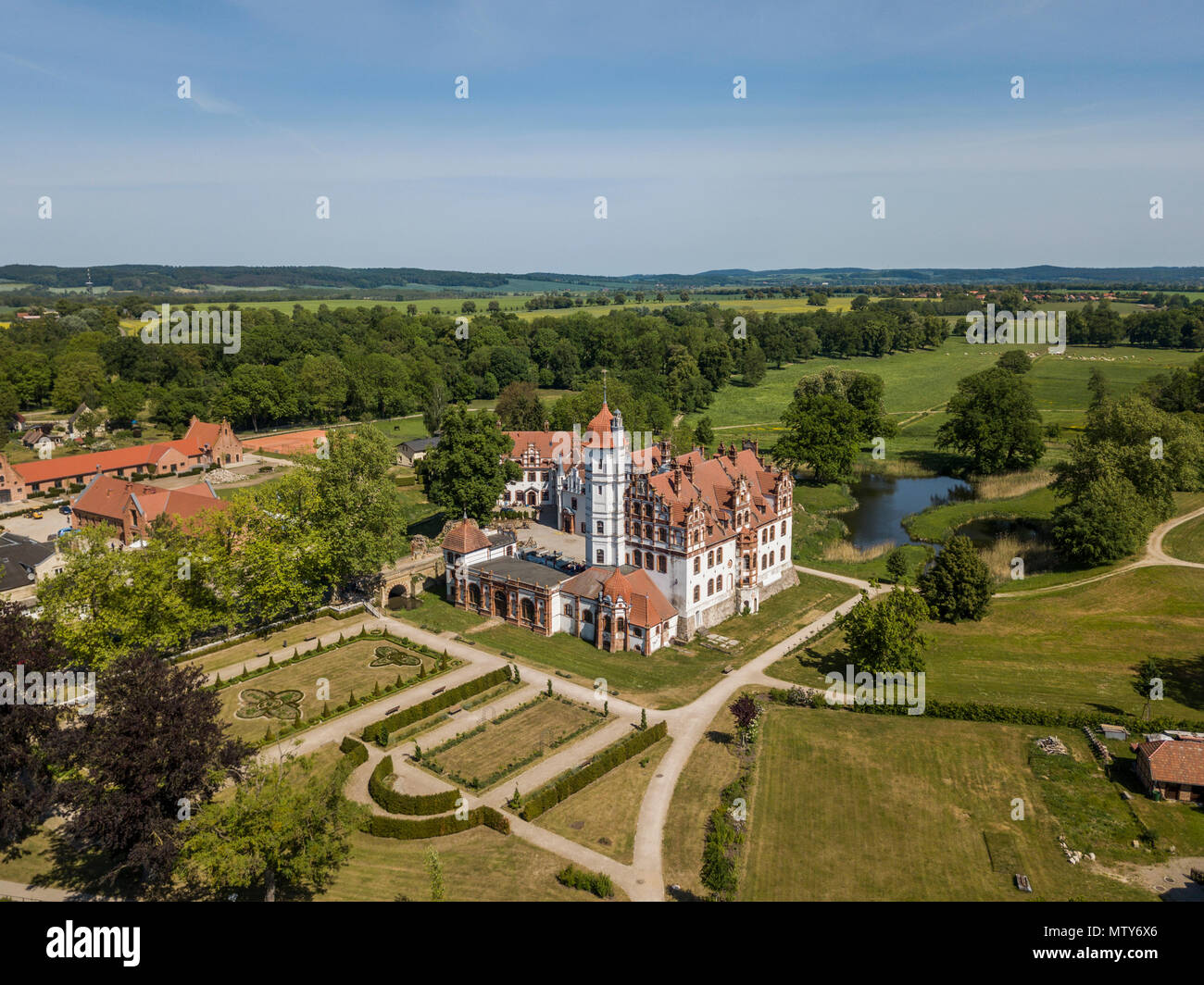 Aerial view of Renaissance Basedow castle with a surrounding landscape park in Mecklenburg-Vorpommern Stock Photo