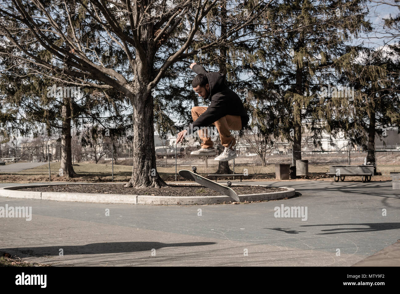 skateboarding at a small skate park Stock Photo