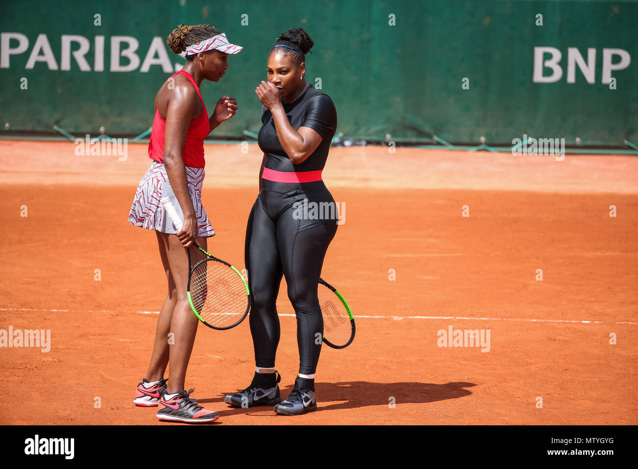 Paris, France. 30th May, 2018. (R-L) Serena Williams, Venus Williams (USA)  Tennis : (R-L) Serena Williams and Venus Williams of the United States  during the Women's doubles first round match of the