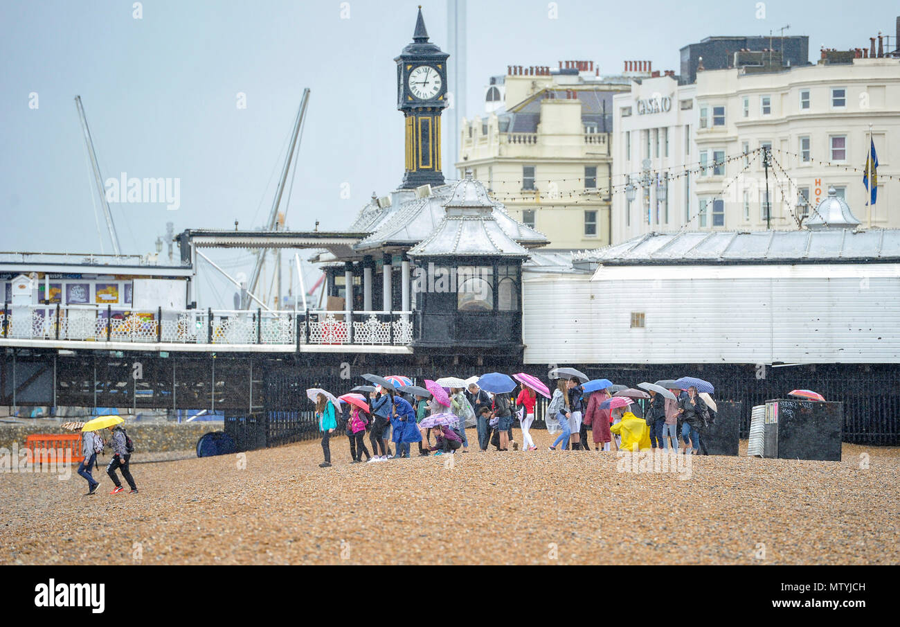 Brighton UK 31st May 2018 Despite the heavy rain visitors were still
