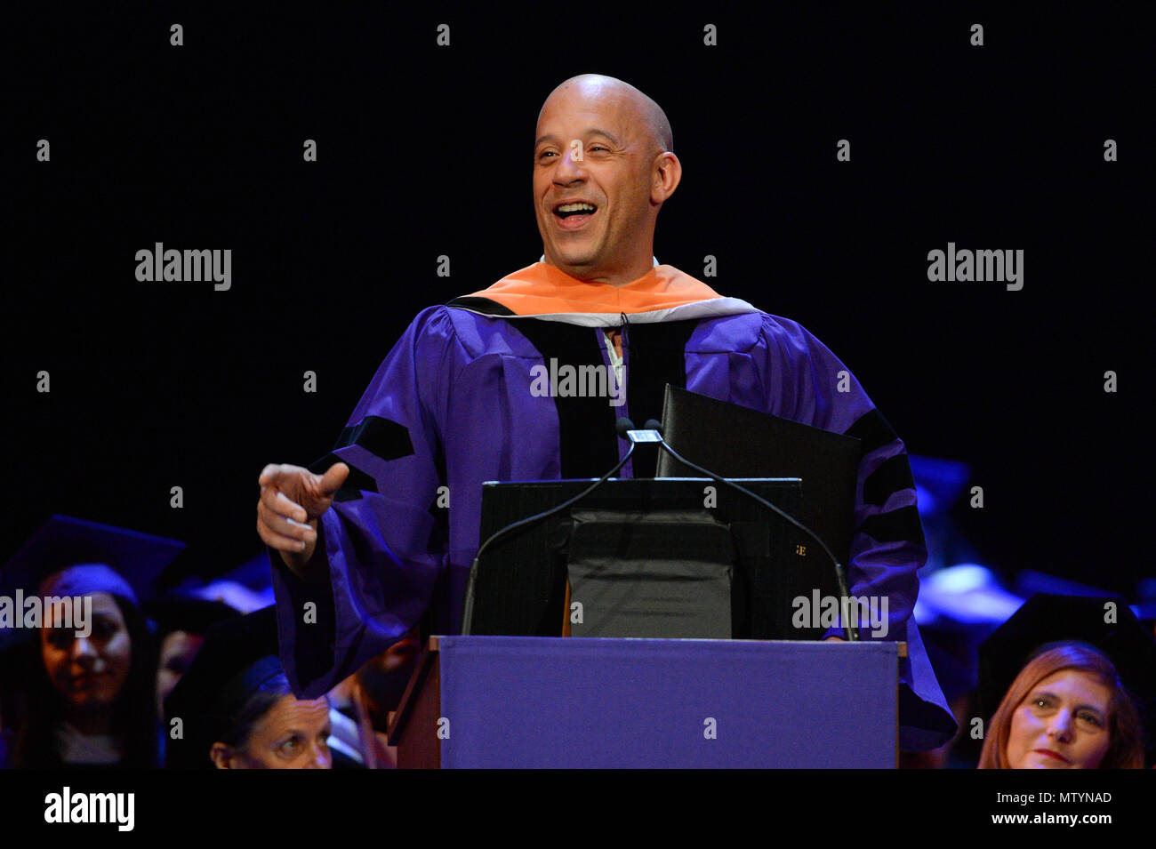 New York, USA. 30th May 2018. Actor Vin Diesel gives a commencement address in front of 1,800 Hunter College students on May 30, 2018 at Radio City Music Hall in New York. Credit: Erik Pendzich/Alamy Live News Stock Photo