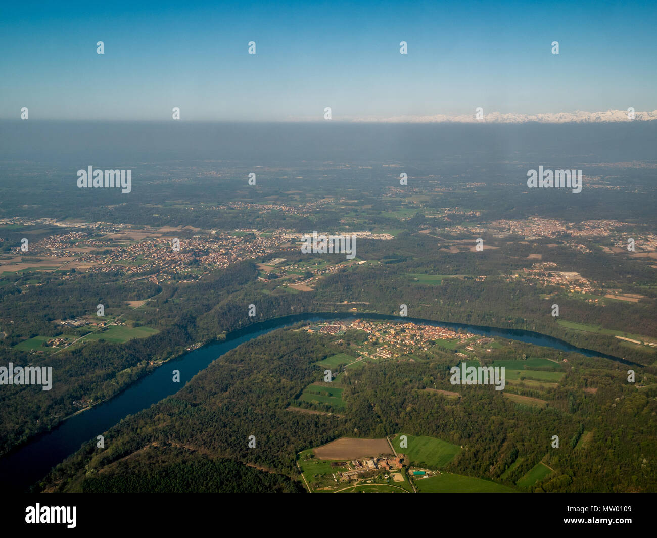 Aerial view of rural landscape with Alps in the distance, Italy Stock ...