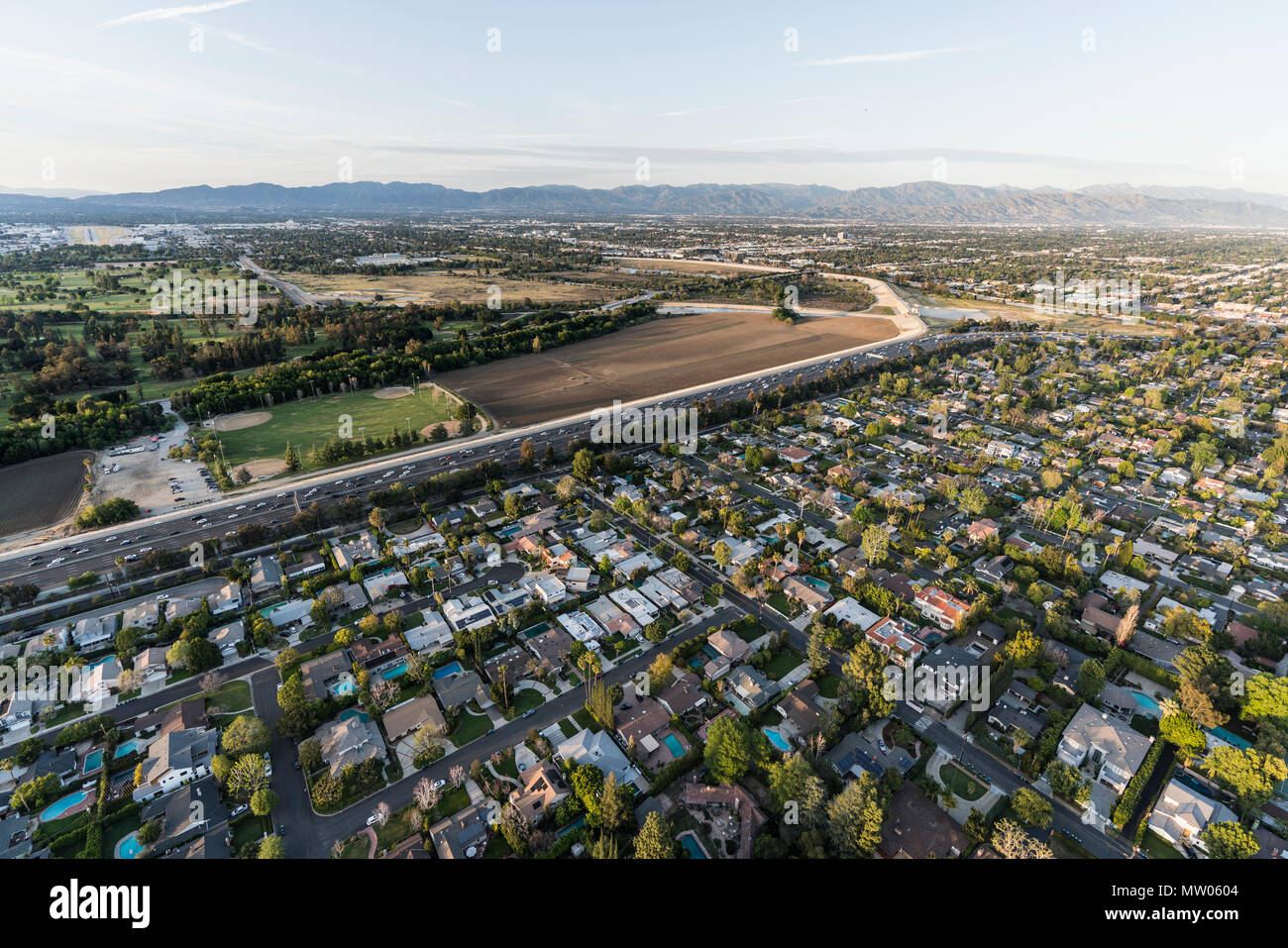 Aerial view of Encino, the Ventura 101 Freeway and Sepulveda Basin in the San Fernando Valley area of Los Angeles, California. Stock Photo