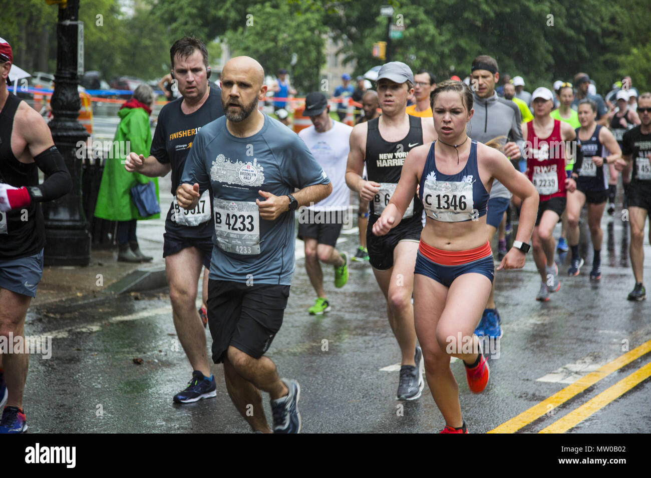 Men Running In Rain High Resolution Stock Photography and Images - Alamy