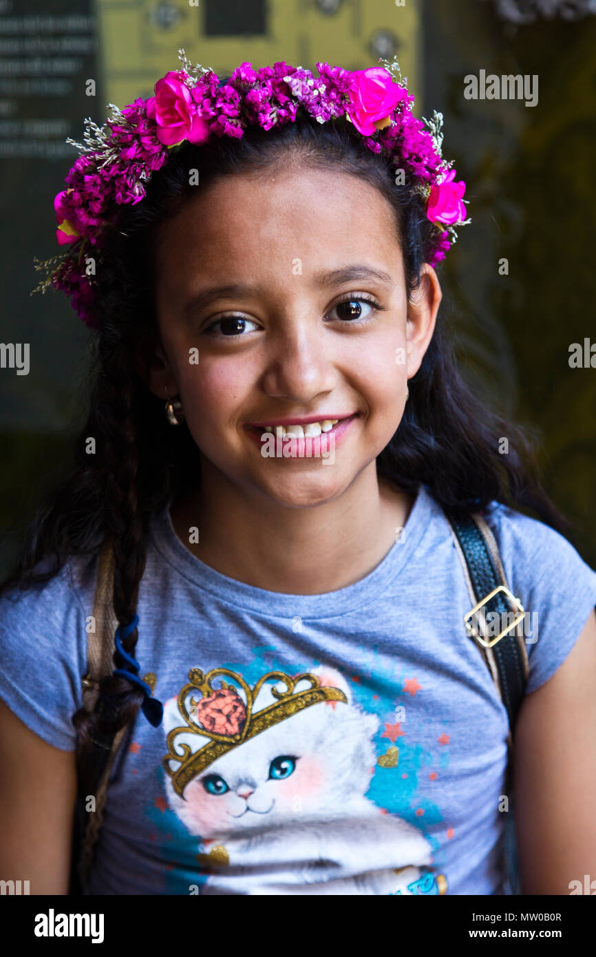 A young MEXICAN GIRL wears a flower halo during Easter Week - SAN MIGUEL DE ALLENDE, MEXICO Stock Photo