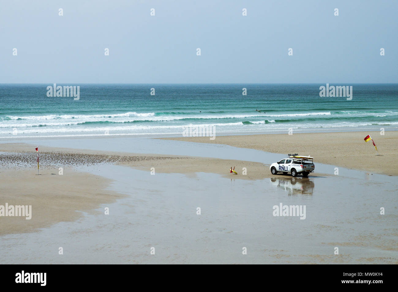 RNLI (Royal National Lifeboat Institution) patrolling the beach in St. Ouen's Bay in Jersey, Channel Islands Stock Photo