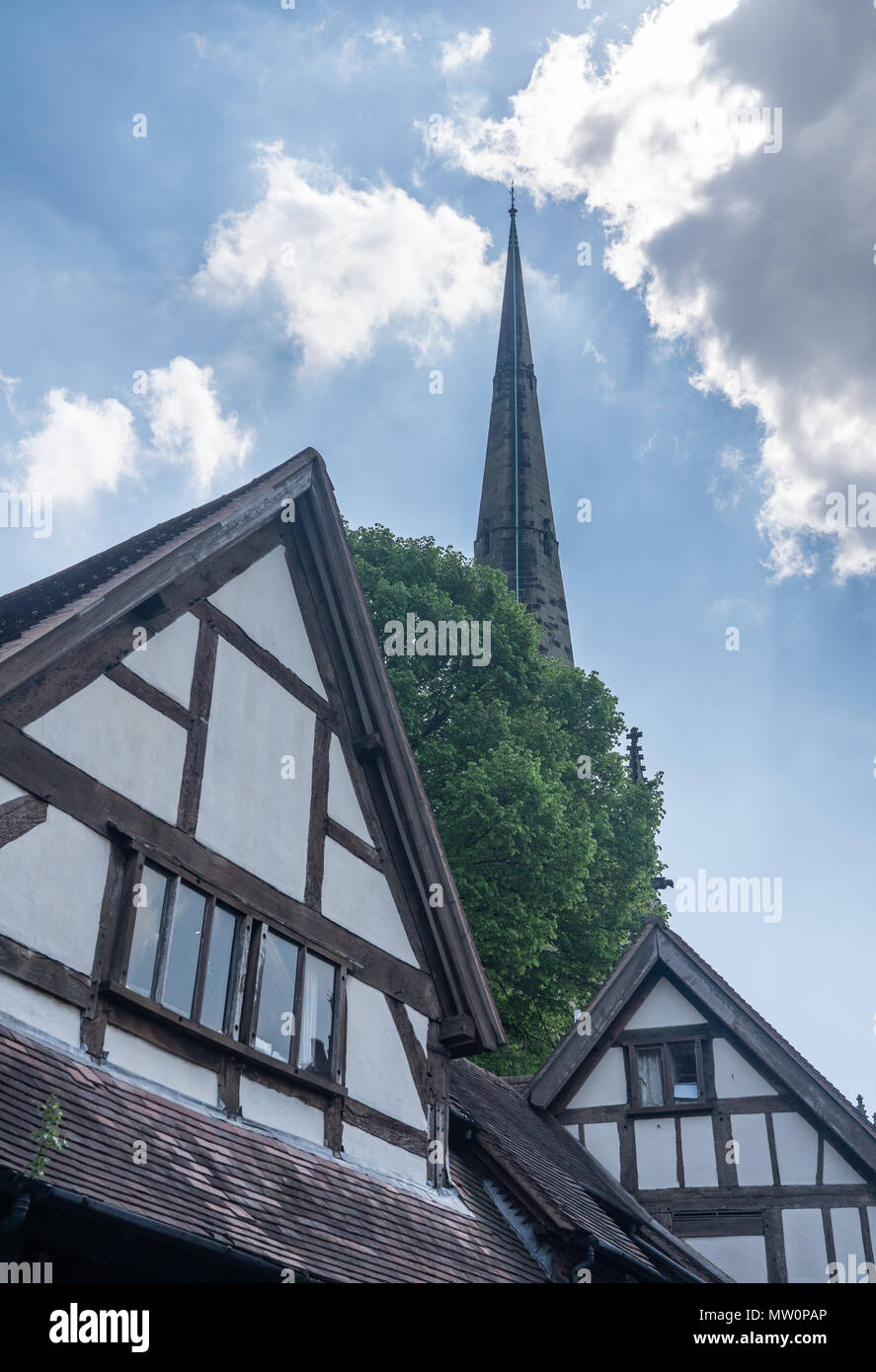 Church spire over homes in Shrewsbury, Shropshire Stock Photo
