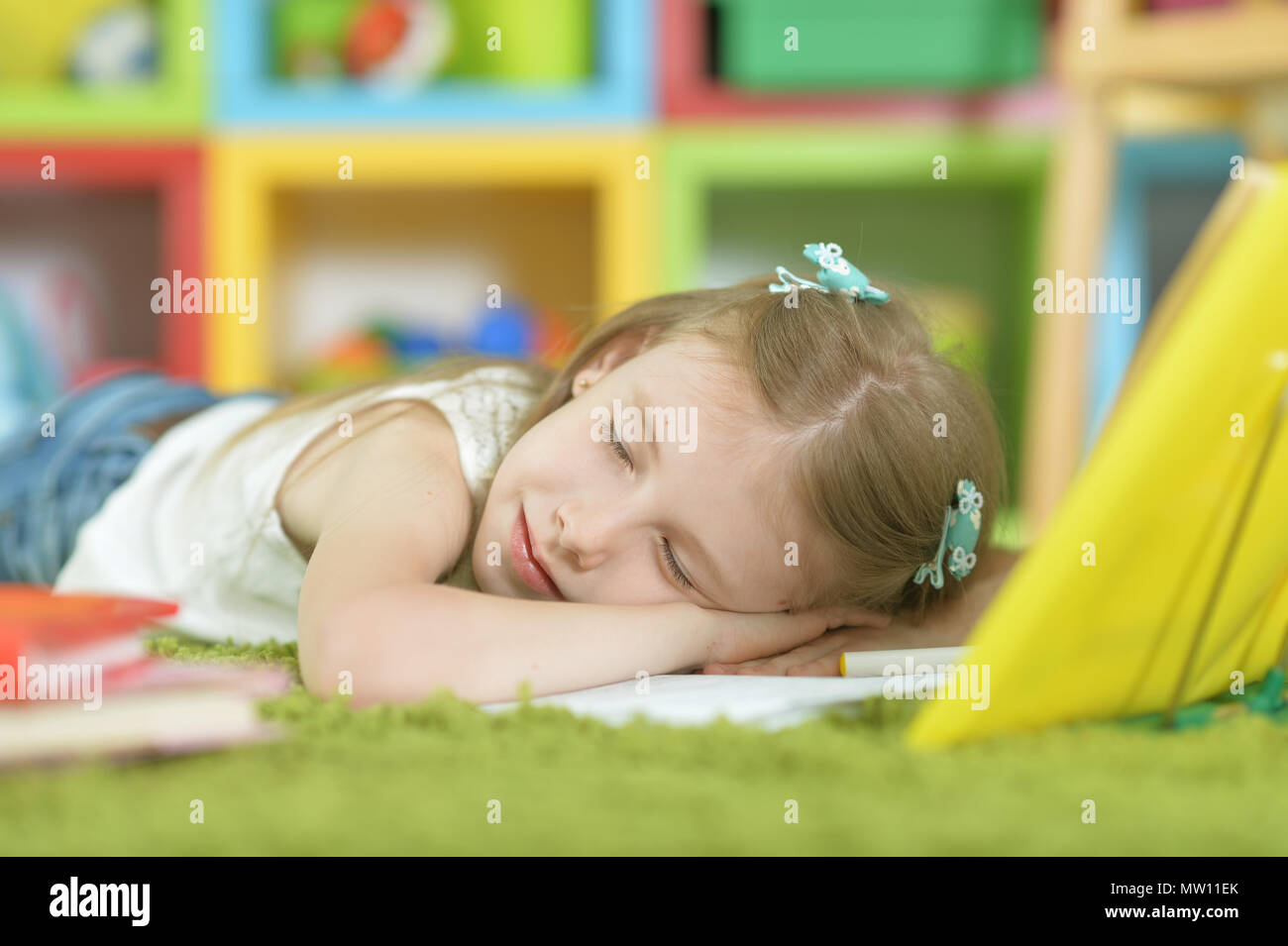 Tired schoolgirl sleeping Stock Photo