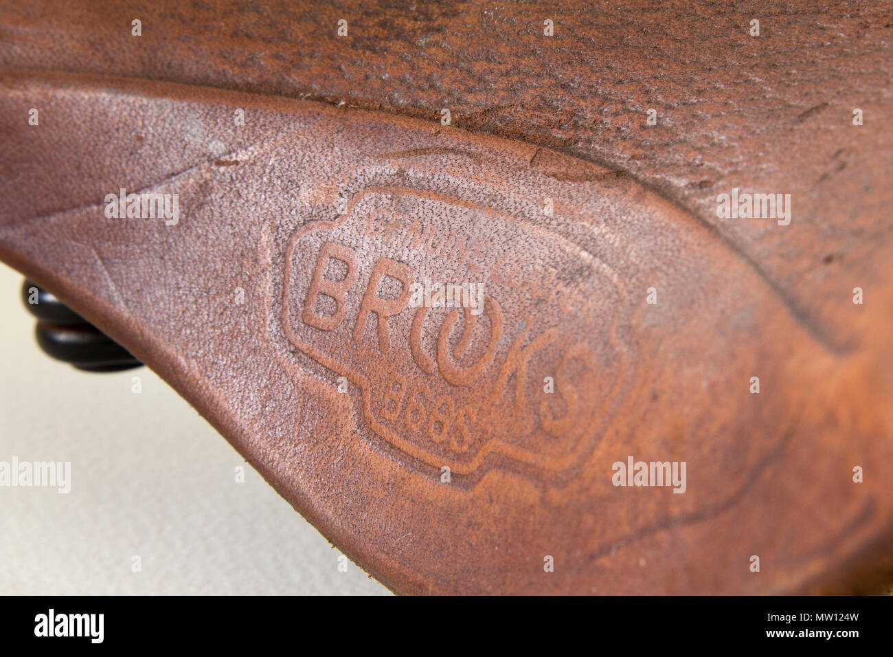 Detail of the vintage Brooks England bicycle saddle Stock Photo