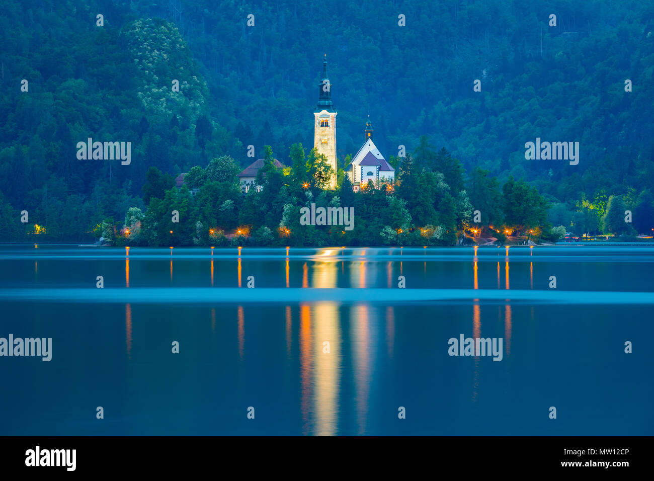 Twilight at Lake Bled with St. Marys Church of the Assumption in Slovenia. Stock Photo