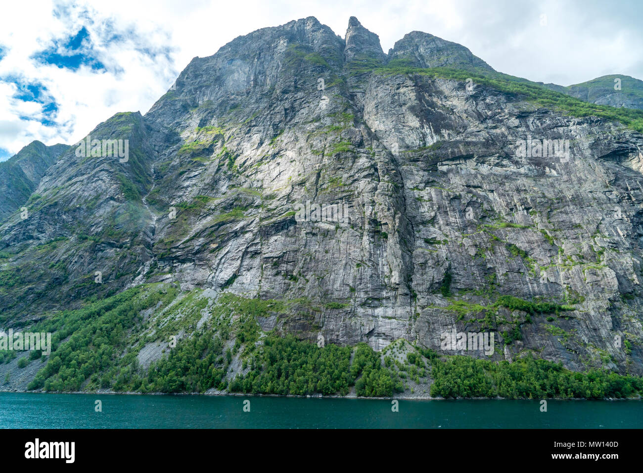 big cliff in the fjords of norway Stock Photo - Alamy