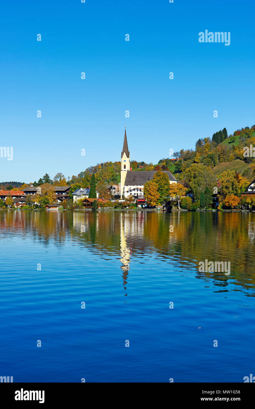 View of Schliersee with parish church St. Sixtus and lake, Schliersee, Upper Bavaria, Bavaria, Germany Stock Photo