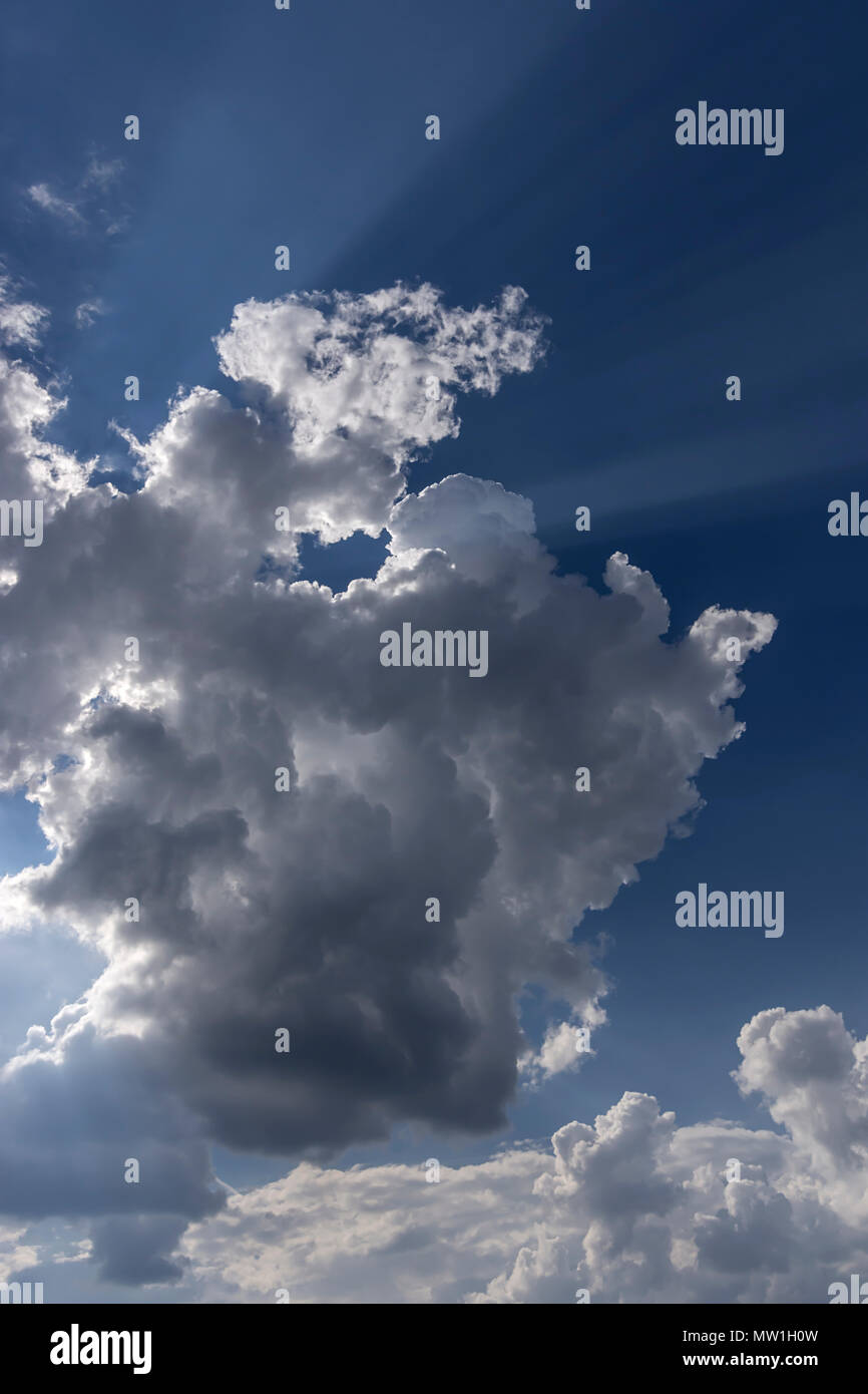 Rain clouds (Nimbostratus) in front of the sun, Bavaria, Germany Stock