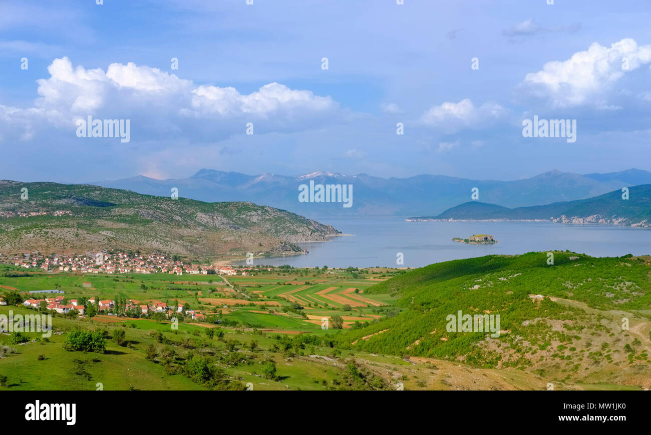 Great Lake Prespa with village Liqenas and island Maligrad, Prespa National Park, near Korça, Albania Stock Photo