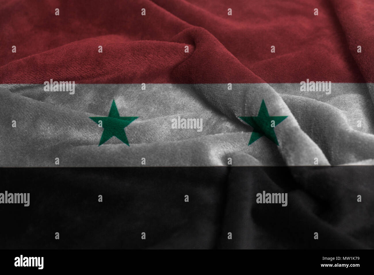 Ruffled Waving Flag of Syria Closeup Background. Stock Photo