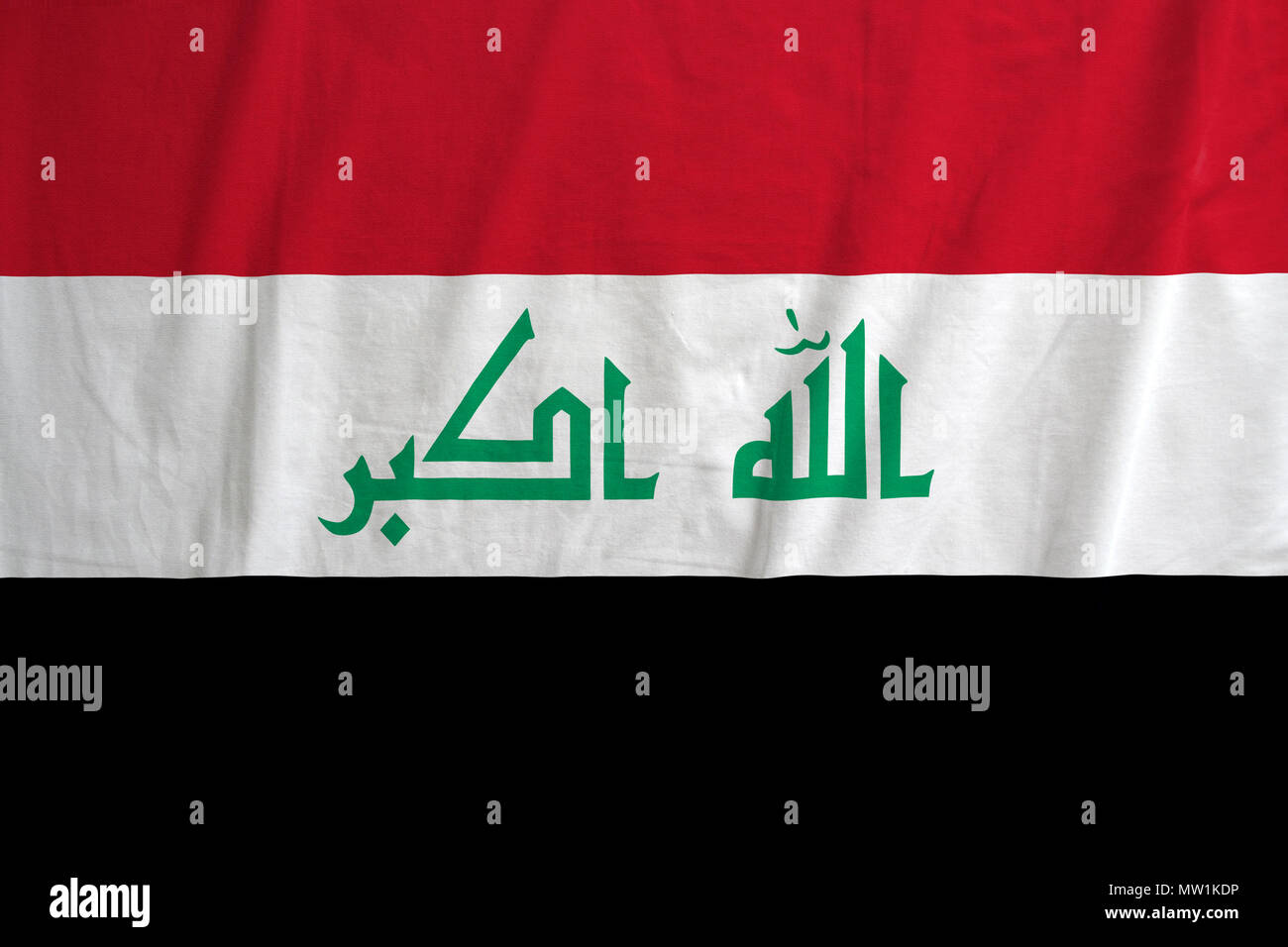 Fabric texture of the flag of Iraq Stock Photo