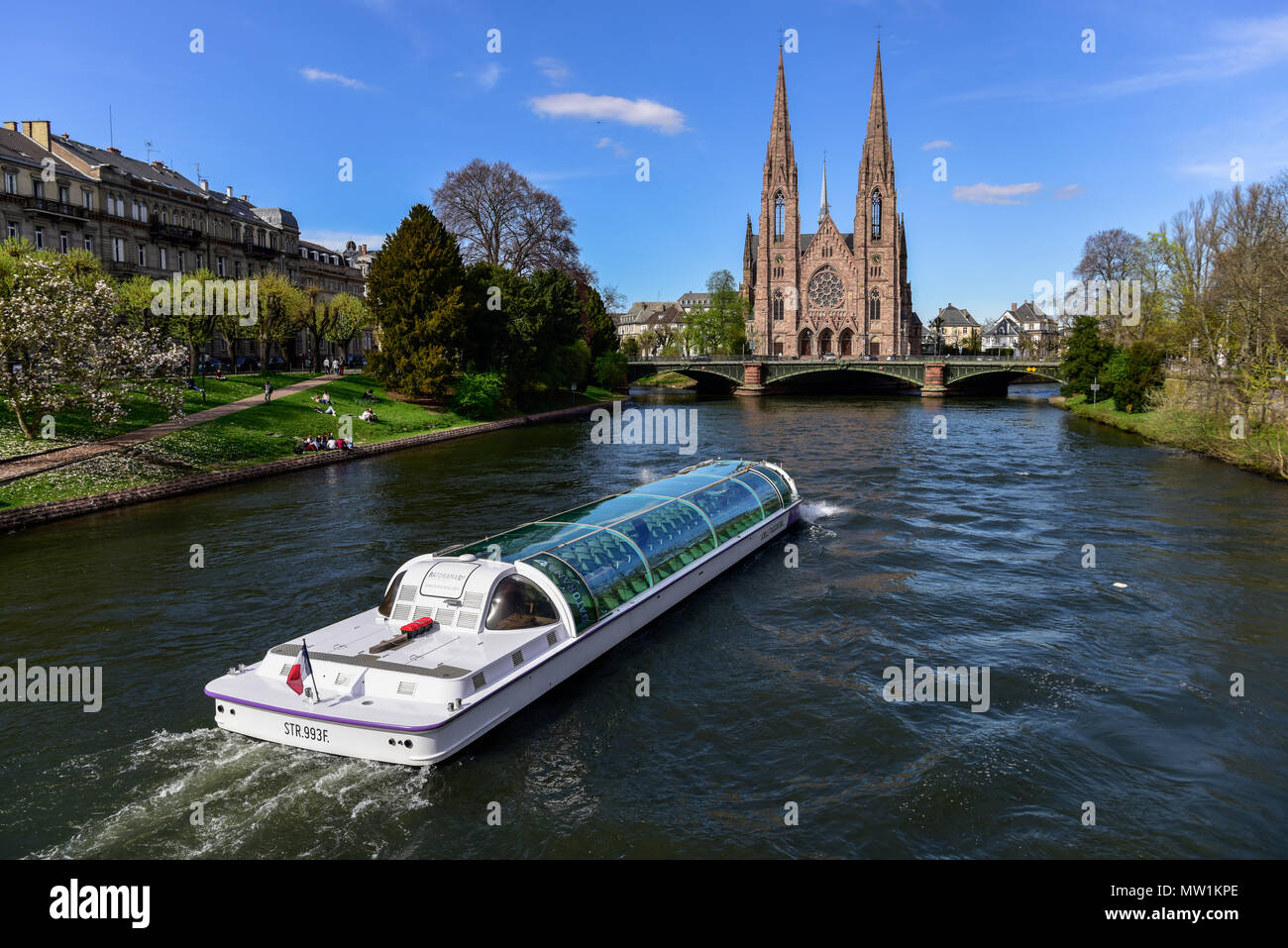 Boat on river Ill with St. Paul's Church, Strasbourg, Alsace, France Stock Photo